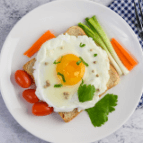 Breakfast plate with fried egg at QuickBite