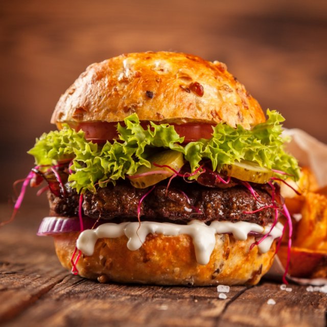 Classic Burger with cheese, lettuce and tomato
